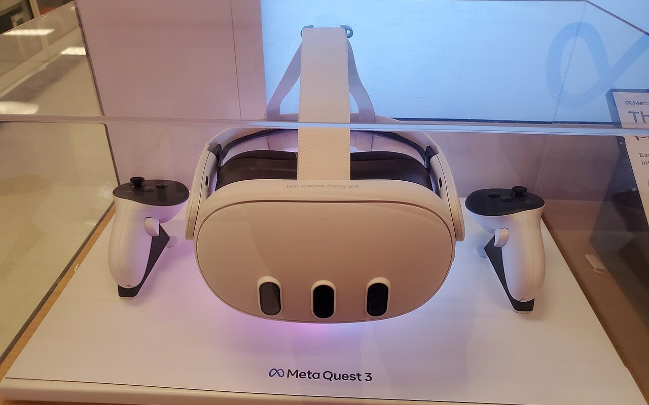 Meta Quest 3 headset and its two Touch Plus controllers on a store display