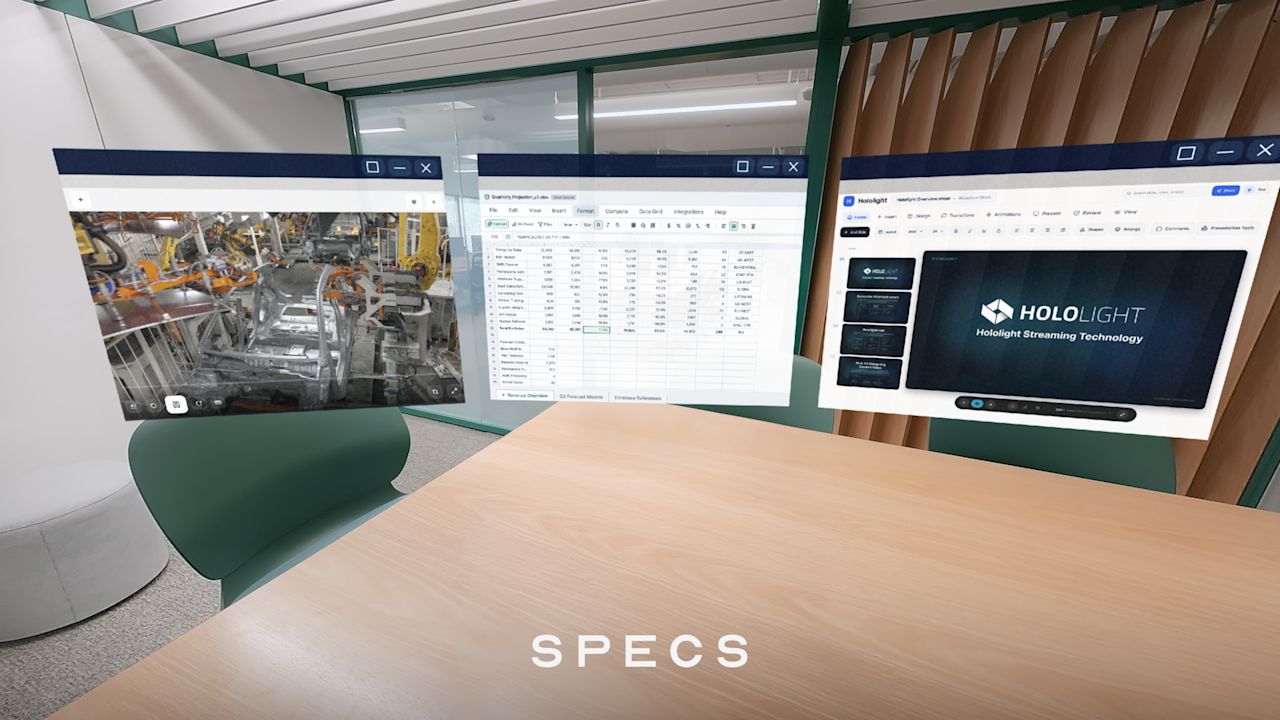 View through Snap Specs of three floating windows in a meeting room: a live video feed of factory robots on a car assembly line, a spreadsheet, and a Hololight presentation deck